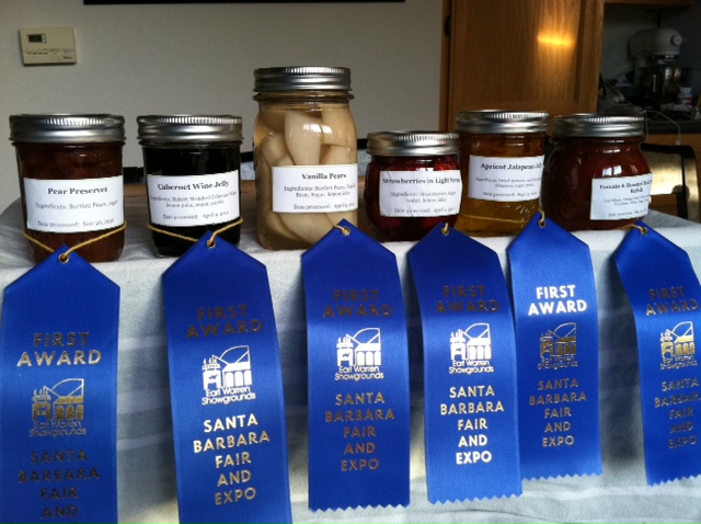 Pear Preserve, Cabernet Wine Jelly, Vanilla Pears, Strawberries in Light Syrup, Apricot Jalapeno Jelly, and Tomato & Roasted Red Pepper Relish