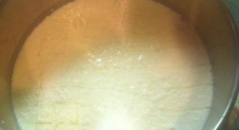 Cut curd one direction with a long knife