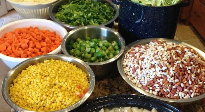 Produce is prepped while meat is cooking